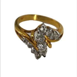 Gold band gemstone ring
